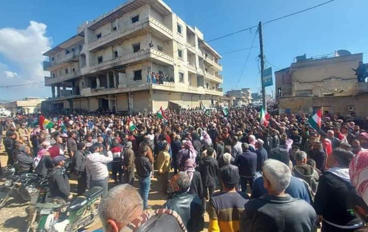 People taking to the streets of Afrin, northwest Syria on March 21, 2023 to protest the killings of four Kurdish citizens. Photo: SOHR