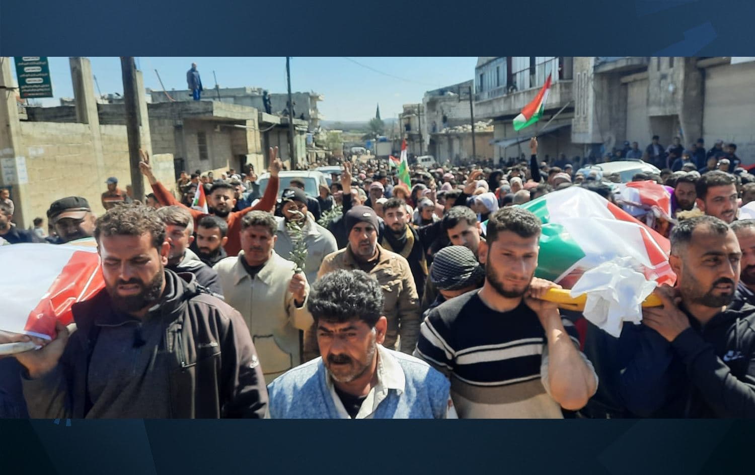 People in Jindires protest the killing of four Kurds during Newroz celebrations, while carrying the victims' bodies on March 21, 2023. Photo: Rudaw/Submitted
