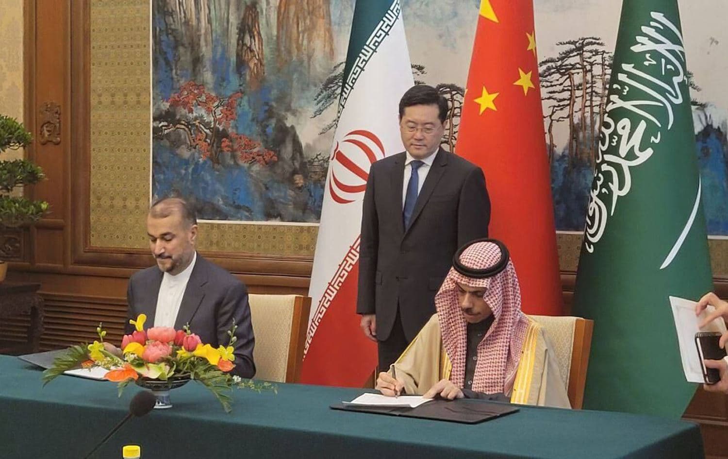 Iranian Foreign Minister Hossein Amir-Abdollahian (left), Chinese Foreign Minister Qin Gang (center), and Saudi Foreign Minister Prince Faisal bin Farhan Al Saud (right) signing an agreement in Beijing on April 6, 2023. Photo: Iranian state media (IRNA)