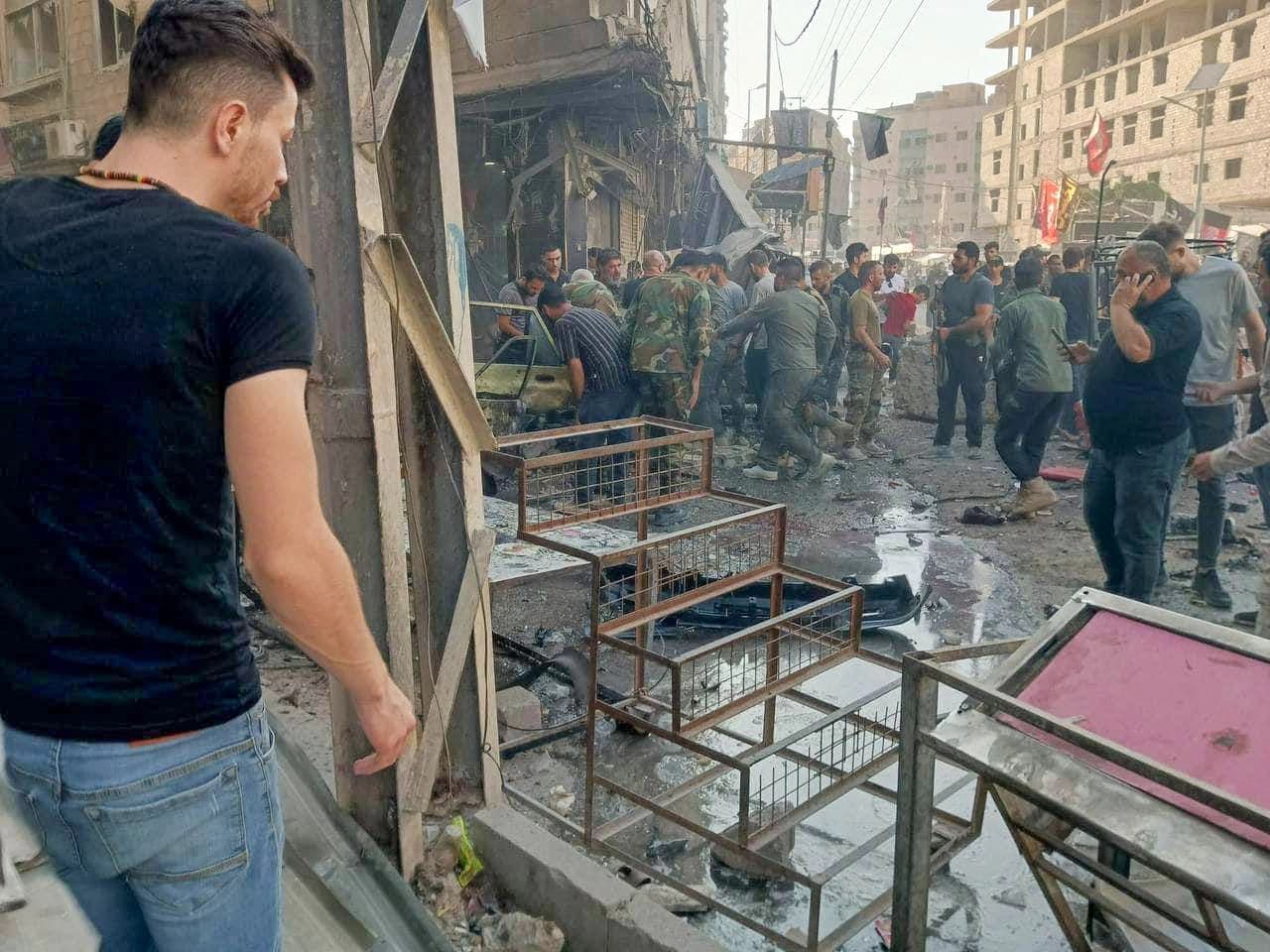 This image release the Syrian television on their Telegram channel shows people gathering at the site of an explosion in the town of Sayyida Zeinab on the outskirts of Damascus on July 27, 2023. Photo: via AFP