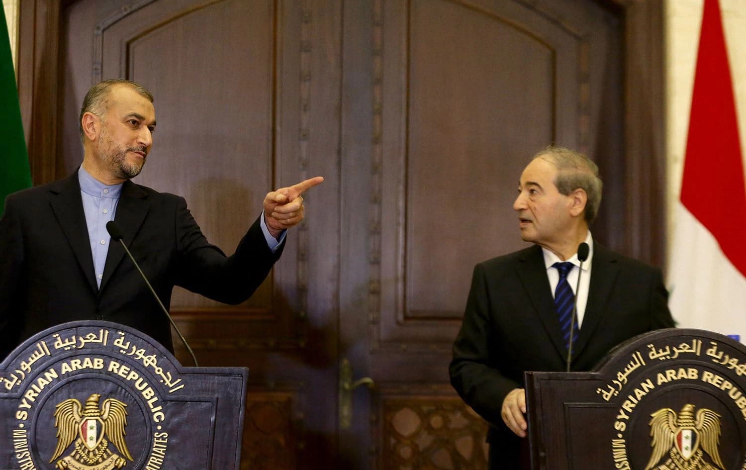 Iranian Foreign Minister Hossein Amir Abdollahian (L) and Syrian Foreign Minister Faisal Mekdad hold a joint press conference at the Syrian Foreign Ministry in Damascus on October 13, 2023. Photo: Louai Beshara/AFP