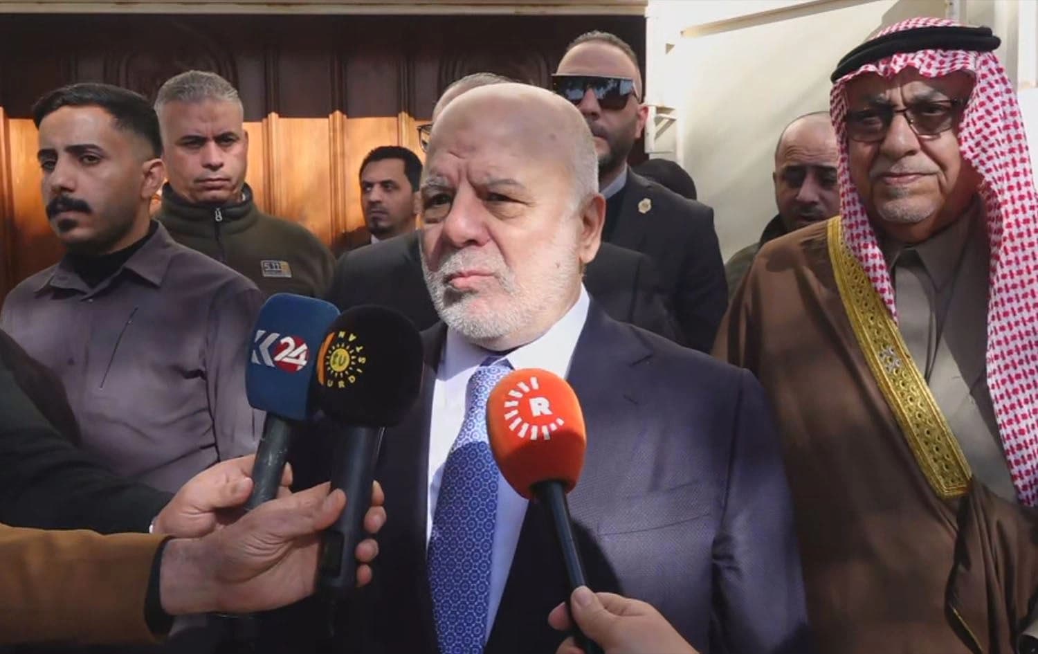 Former Iraqi prime minister Haider al-Abadi speaking to reporters in Baghdad on January 14, 2024. Photo: Rudaw