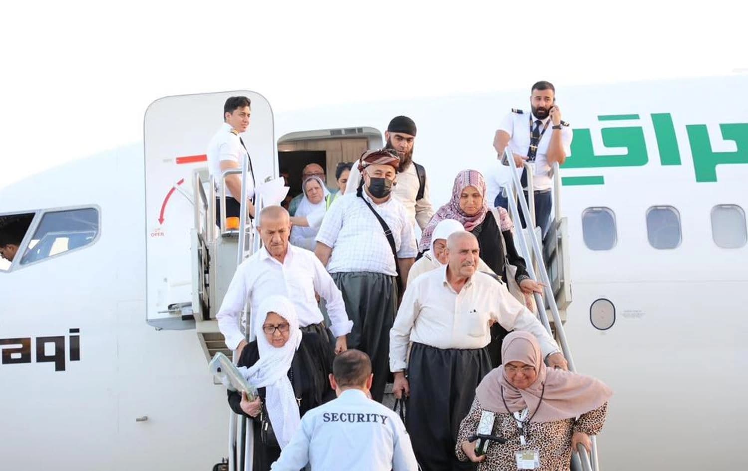 وێنەیەکی ئەرشیڤیی کاتی گەڕانەوەی ژمارەی حاجیی هەرێمی کوردستان لە حەج