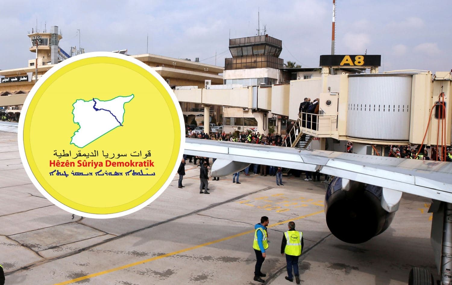 فڕۆکەخانەی نێودەوڵەتیی حەلەب و لۆگۆی هەسەدە.