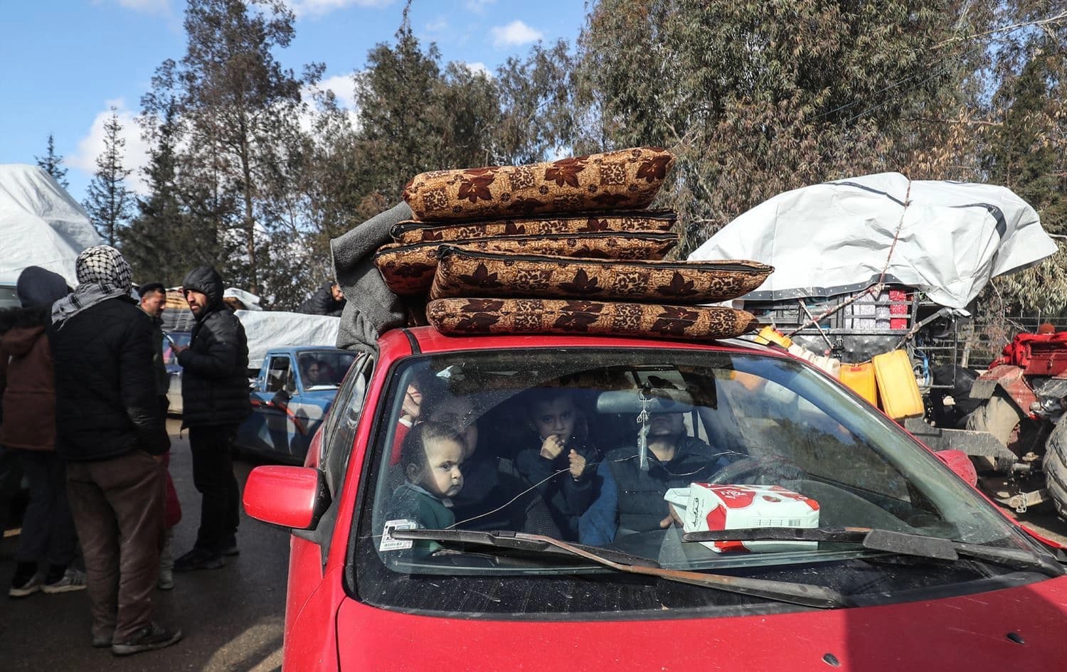 ئاوارەبوونی هاونیشتمانییان لە رۆژئاوای کوردستان. وێنە: AFP
