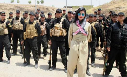 Pop star Helly Luv performs to pump up Peshmerga