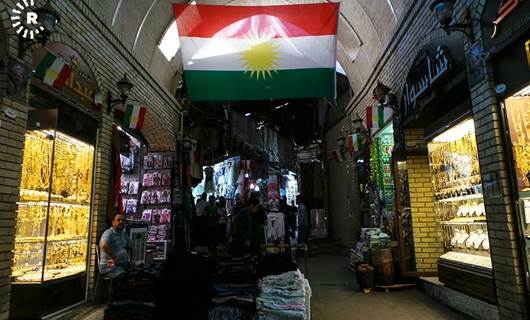 Colorful Kurdish flags adorn shops and streets ahead of referendum