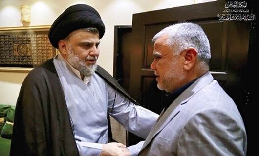 Sadr calls for swift government transition in meeting with Amiri