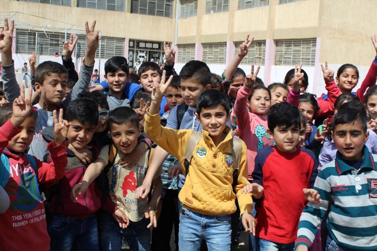 Photo of Syrian schoolkids via ANHA 