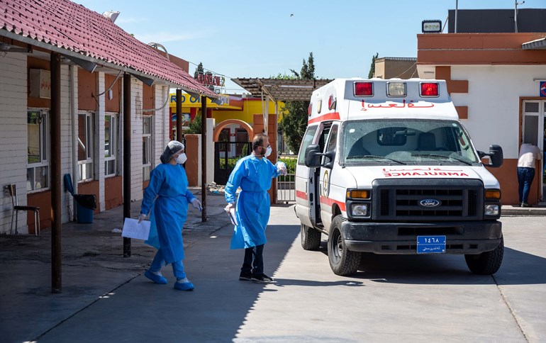 Doctors attend to the emergency wing at a coronavirus treatment center in Erbil. Photo: Bilind T. Abdullah