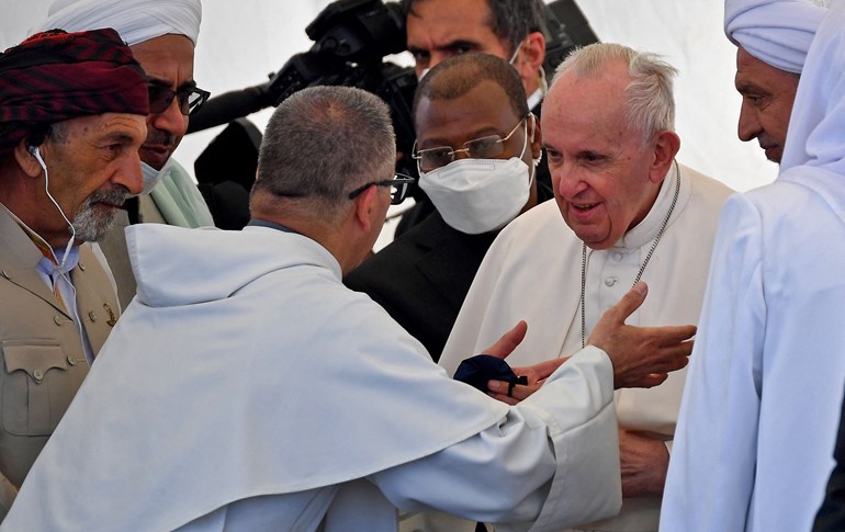 Pope Francis is greeted during an interfaith meeting in the ancient city of Ur in southern Iraq's Dhi Qar province, on March 6, 2021. Photo: Vincenzo Pinto/AFP