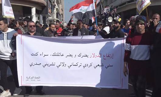 Iraqis in Baghdad protest devaluation of dinar