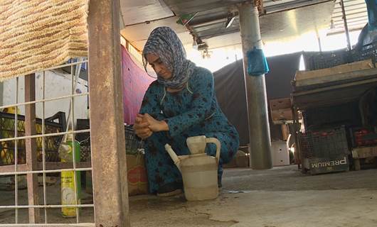 Water scarcity makes scorching summer harder in Erbil camp