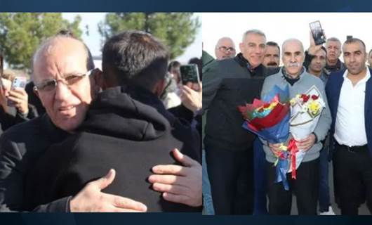 30 yıl sonra serbest kaldılar Abdulrakip Yüksekbağ (solda) / Enver Uçar (elinde çiçek tutan)