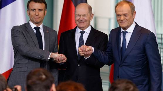 Ji milê çepê ve Emmanuel Macron, Olaf Scholz û Donald Tusk/Wêne: AFP