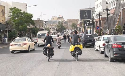Two cyclists arrive in Erbil from France en route to Mecca