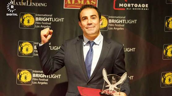 Rudaw's Sinan Tuncdemir with the International Brightlight Film Festival award for best documentary in Los Angeles, California on June 26, 2024. Photo: Rudaw
