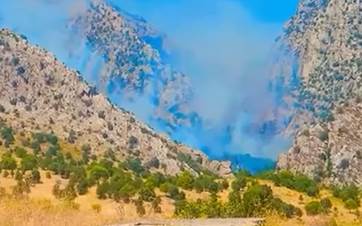 تصاعد الدخان من إحدى قرى دهوك إثر قصف تركي