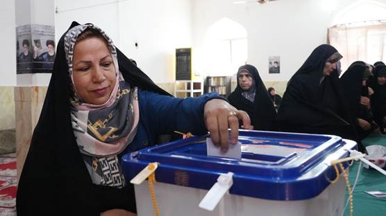 A women casts her ballot. Photo: AFP