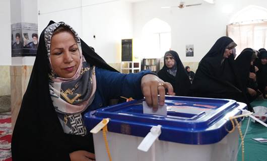 A women casts her ballot. Photo: AFP