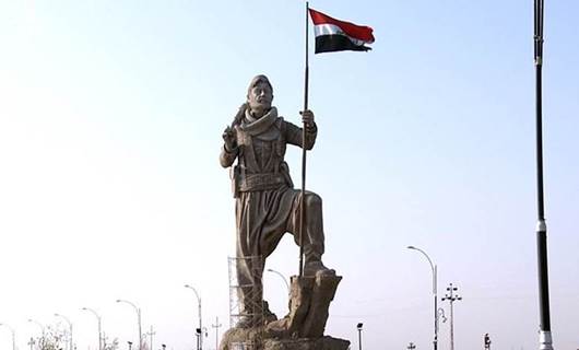 The Iraqi flag replaced the Kurdistan one on Kirkuk’s Peshmerga statue, guarding over the northern gate to the city, when Iraqi forces took over control of the city in October. Photo: Rudaw